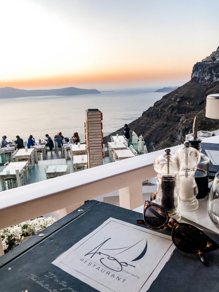 argo restaurant menu fira santorini with view of the sunset and aegean sea