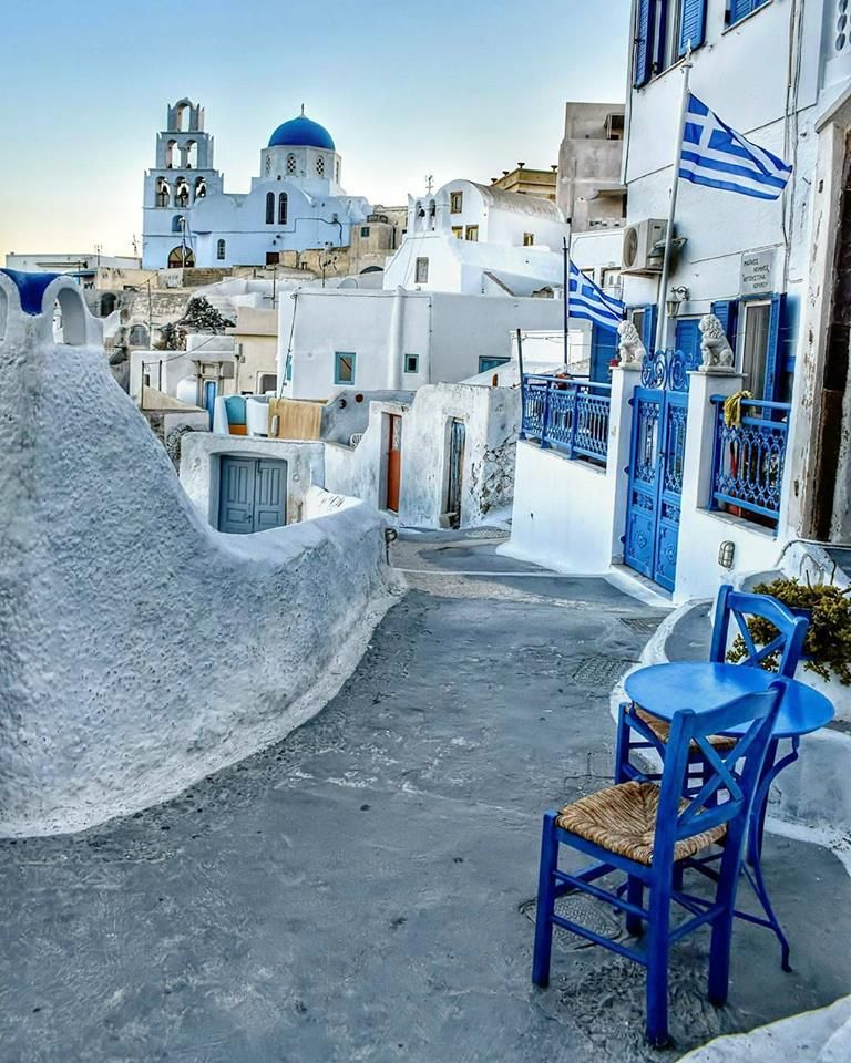 blue and white-washed alleys of Pyrgos village in santorini greece