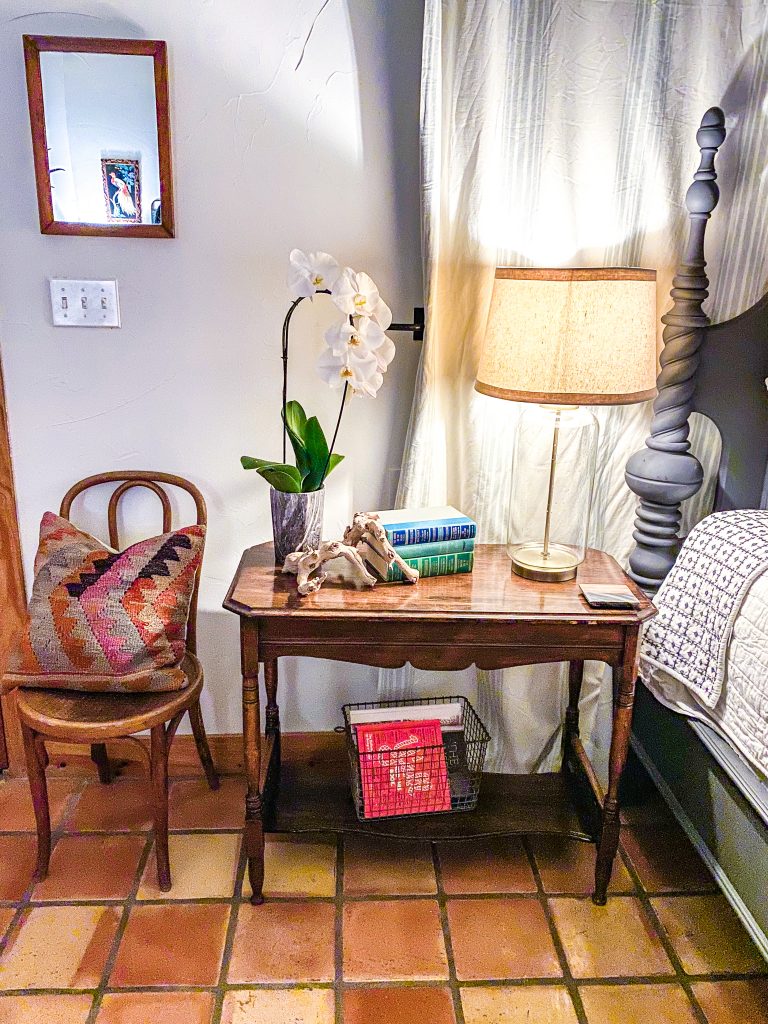 nightstand/side table in master bedroom in emma haus fredericksburg luxury vacation rental, airbnb rental in fredericksburg tx, charming rental in texas hill country