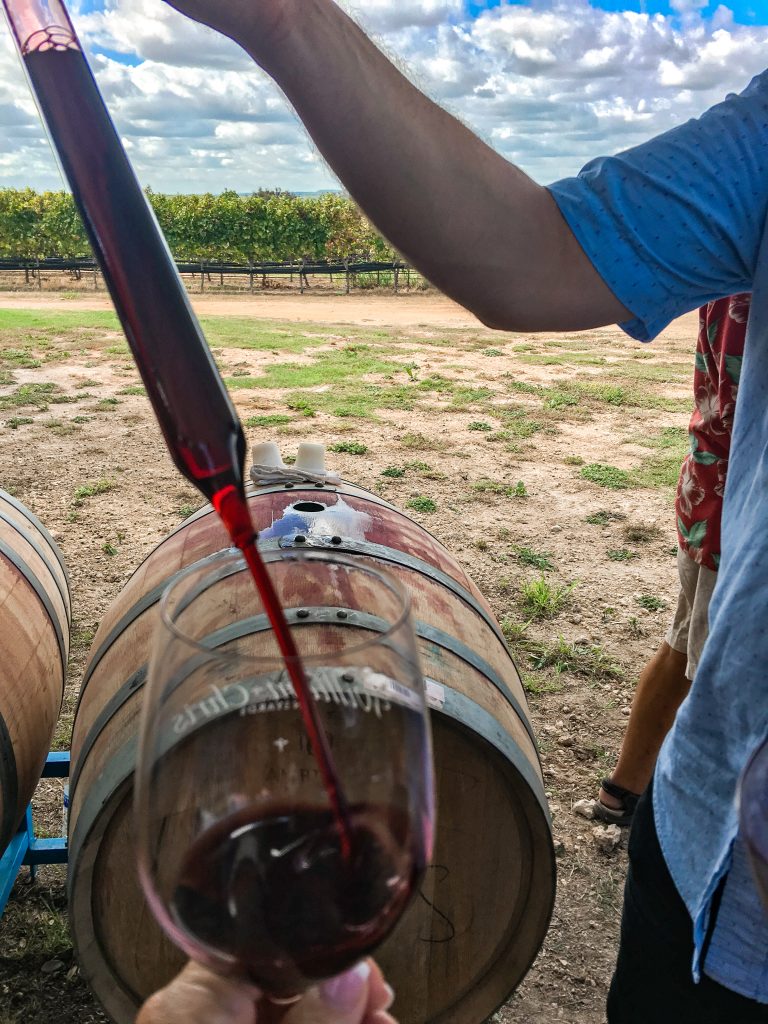 barrel tasting at william chris vineyards winery in fredericksburg texas, fresh wine tasting straight from the barrel