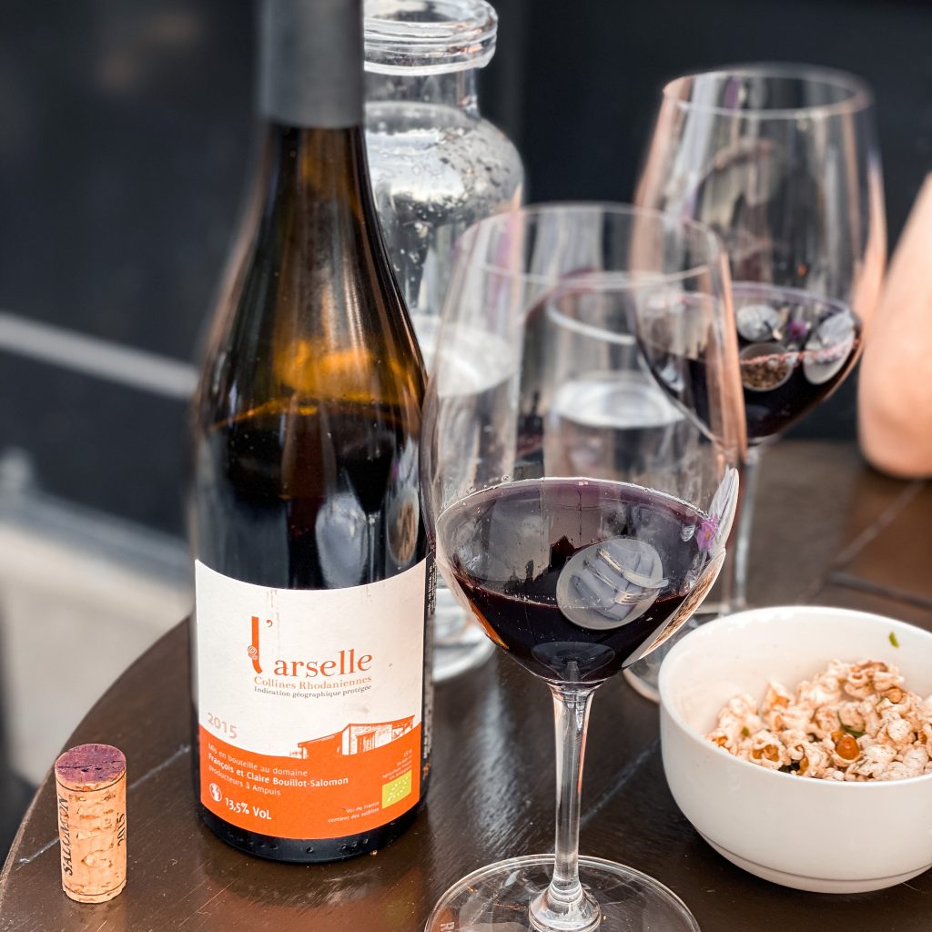 Complimentary popcorn and a bottle of wine at The Lark restaurant in Santa Barbara. Best restaurants in Santa Barbara. Best dinner in Santa Barbara. Where to eat dinner in Santa Barbara. Santa Barbara Funk Zone Restaurants.